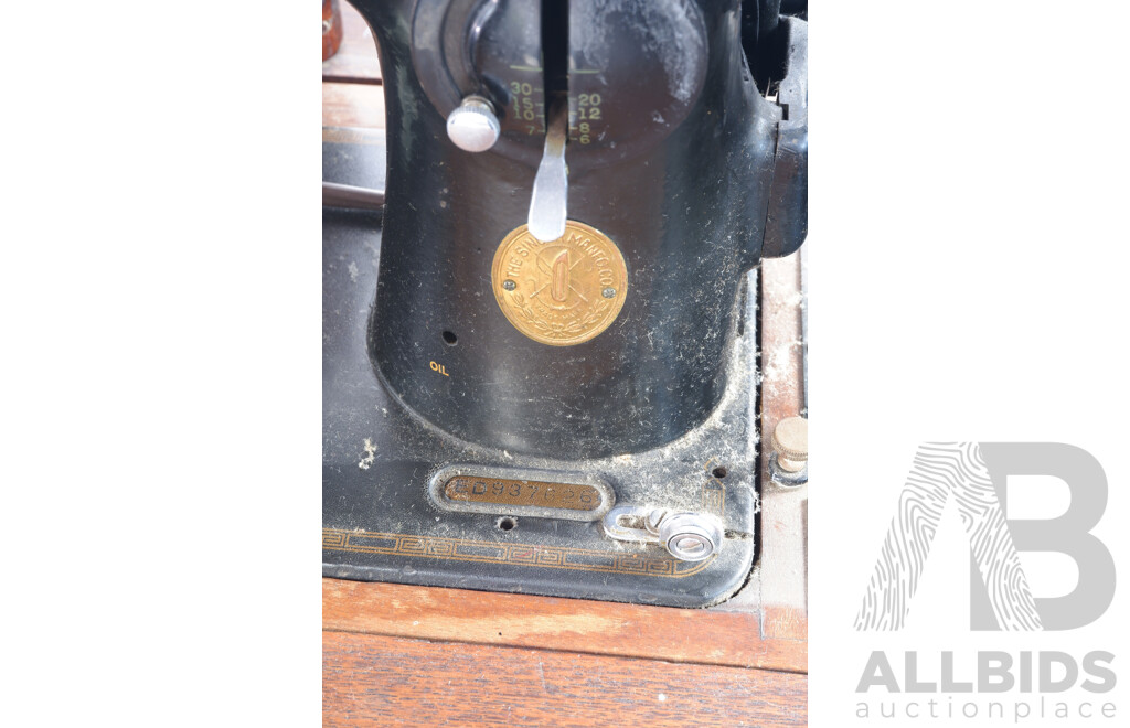 Antique Singer Sewing Machine Mounted in Oak Table