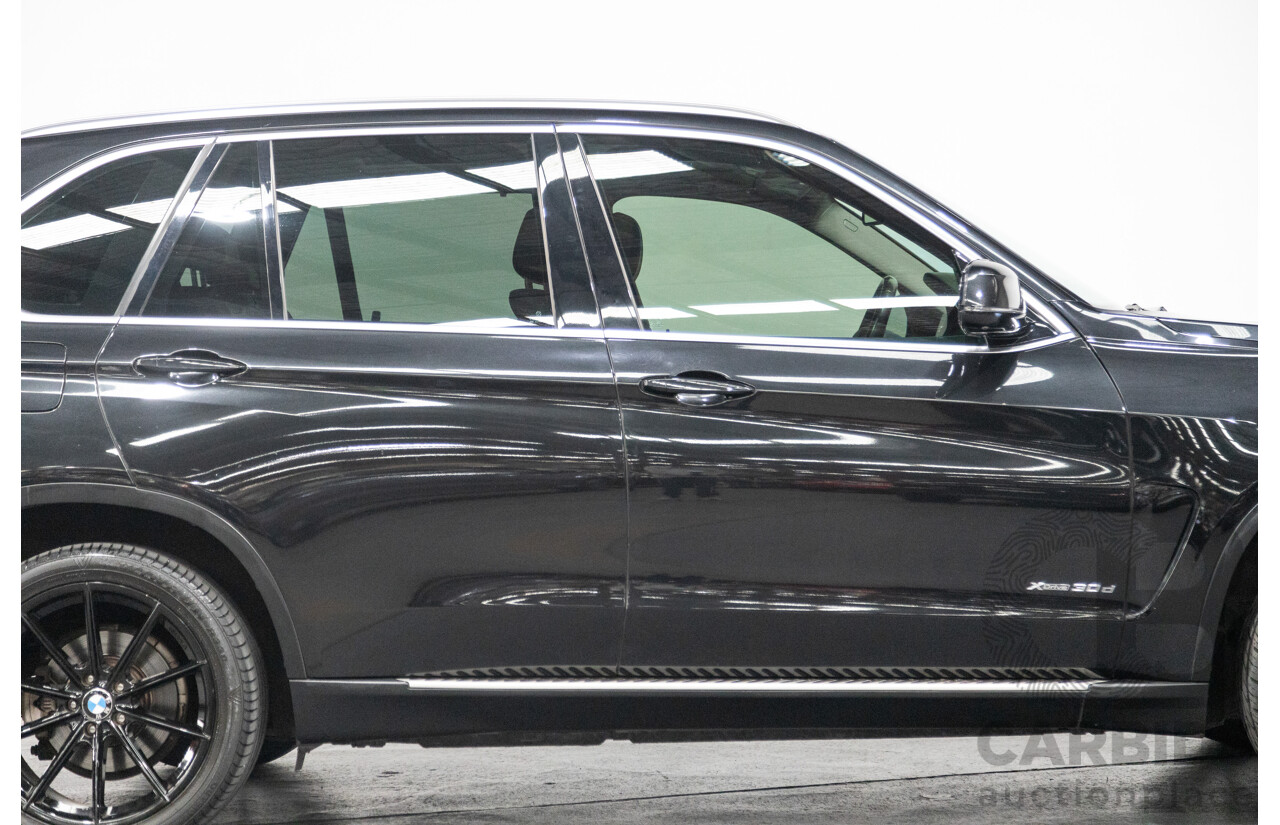 11/2013 BMW X5 xDrive30d (AWD) F15 4D Wagon Metallic Black Turbo Diesel 3.0L - 7 Seater