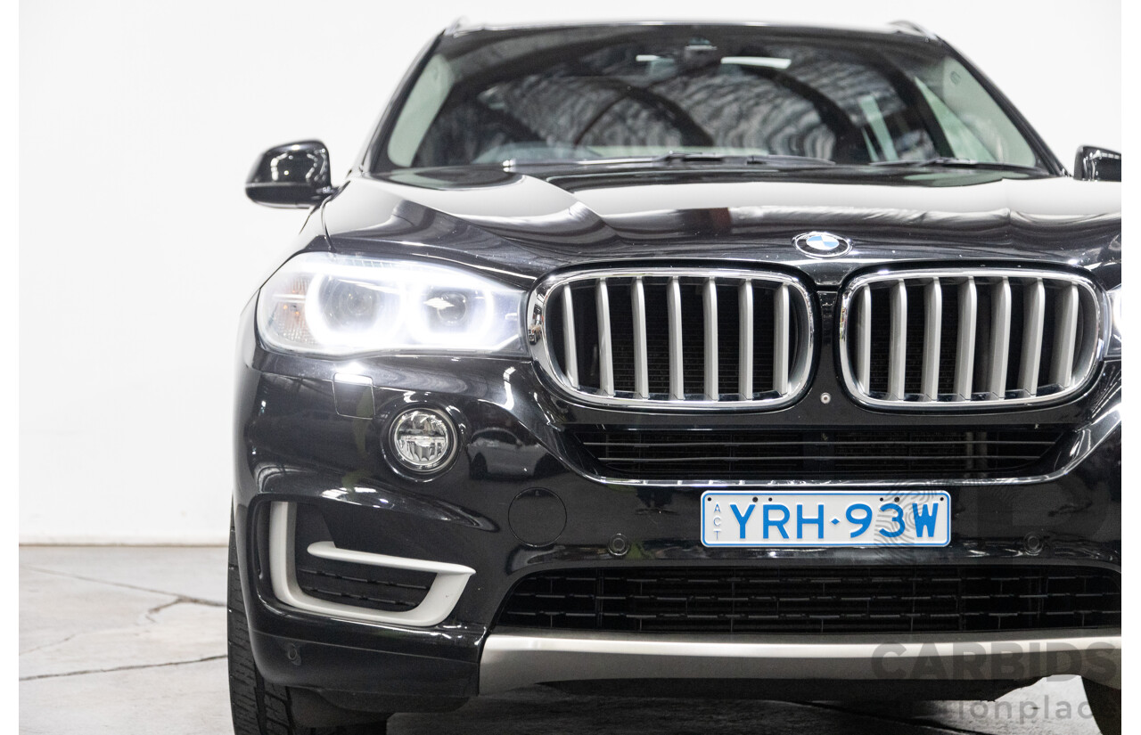 11/2013 BMW X5 xDrive30d (AWD) F15 4D Wagon Metallic Black Turbo Diesel 3.0L - 7 Seater