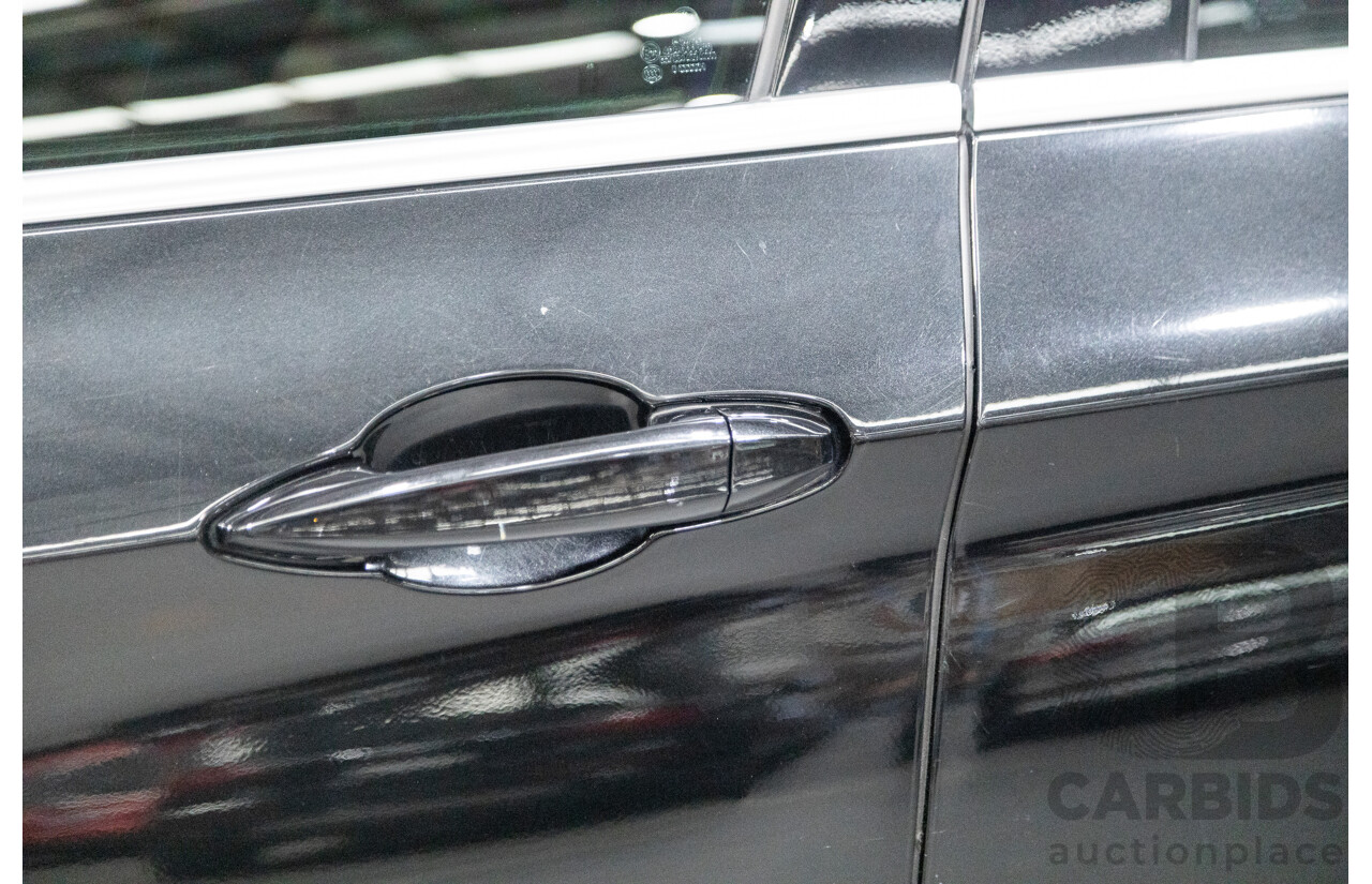 11/2013 BMW X5 xDrive30d (AWD) F15 4D Wagon Metallic Black Turbo Diesel 3.0L - 7 Seater