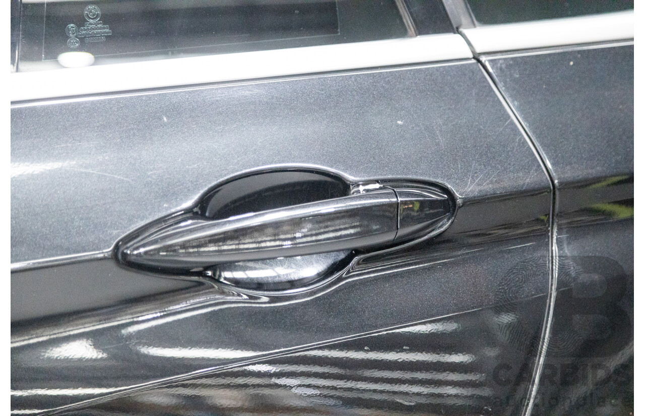 11/2013 BMW X5 xDrive30d (AWD) F15 4D Wagon Metallic Black Turbo Diesel 3.0L - 7 Seater