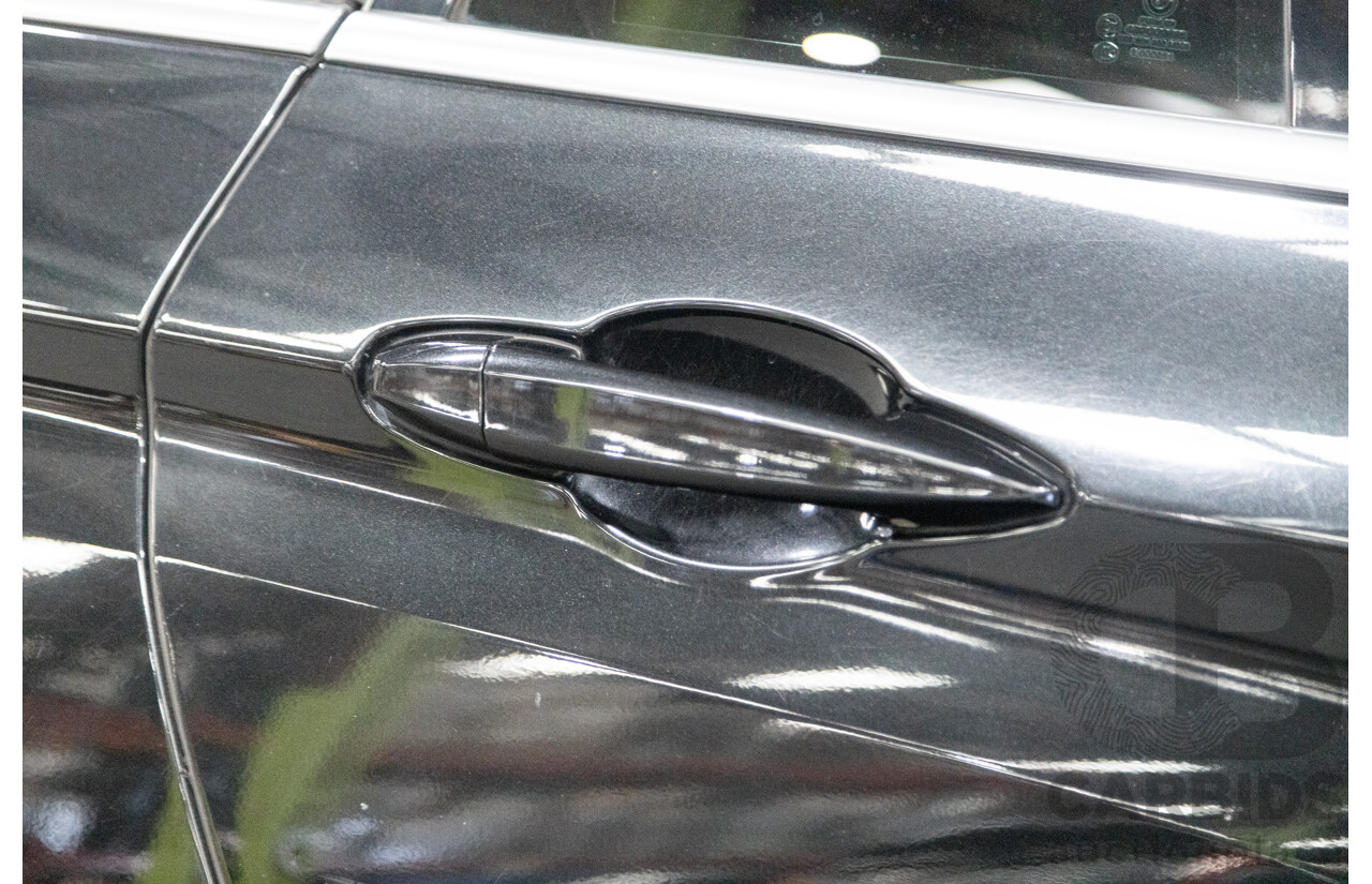 11/2013 BMW X5 xDrive30d (AWD) F15 4D Wagon Metallic Black Turbo Diesel 3.0L - 7 Seater