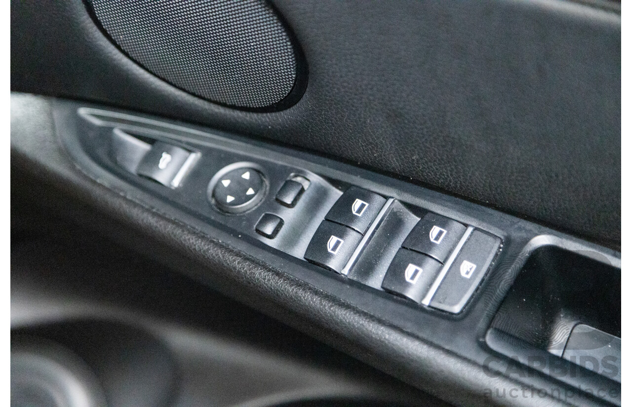 11/2013 BMW X5 xDrive30d (AWD) F15 4D Wagon Metallic Black Turbo Diesel 3.0L - 7 Seater