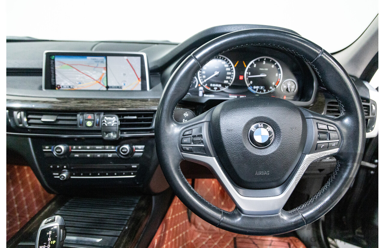 11/2013 BMW X5 xDrive30d (AWD) F15 4D Wagon Metallic Black Turbo Diesel 3.0L - 7 Seater