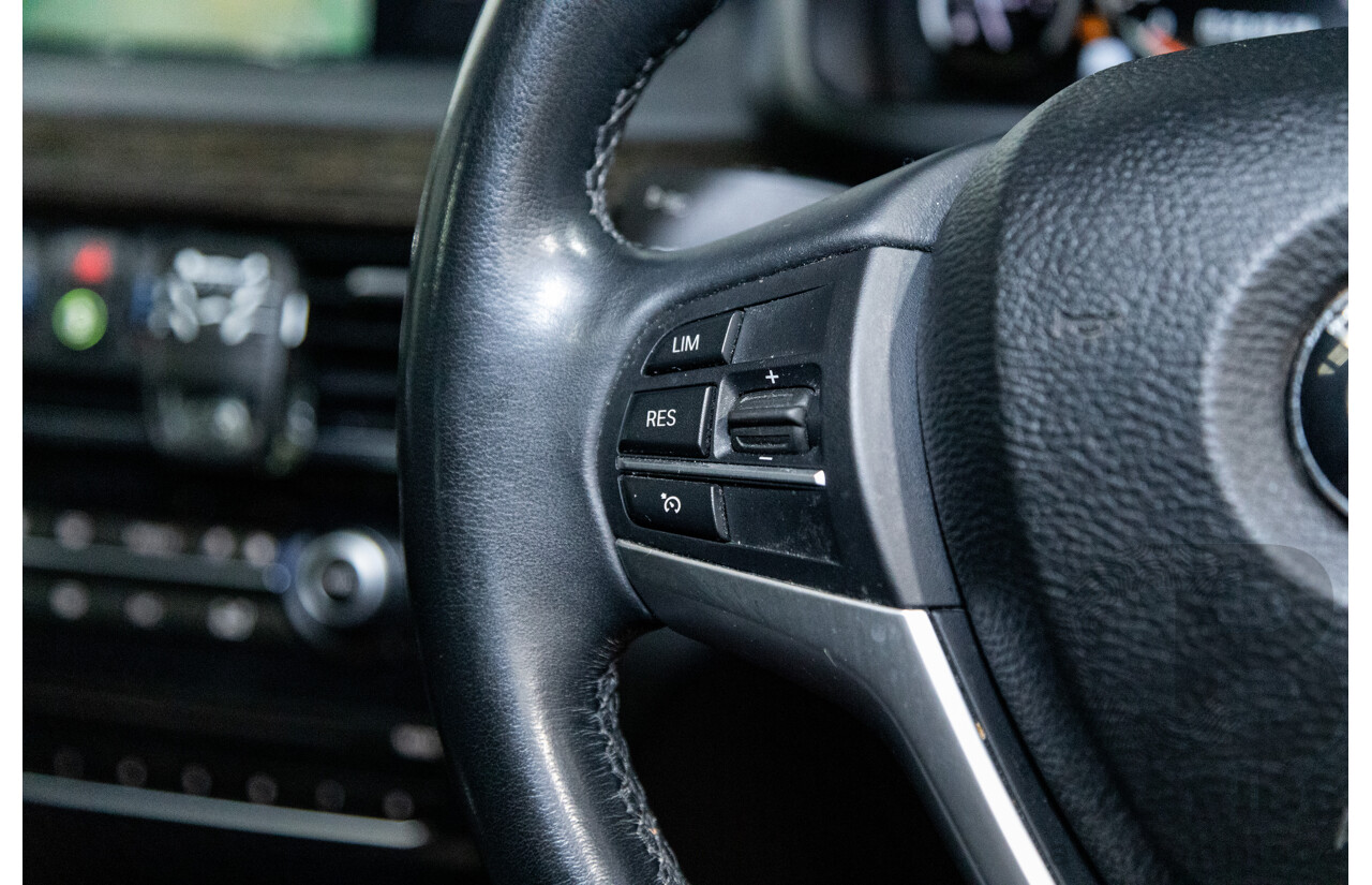 11/2013 BMW X5 xDrive30d (AWD) F15 4D Wagon Metallic Black Turbo Diesel 3.0L - 7 Seater