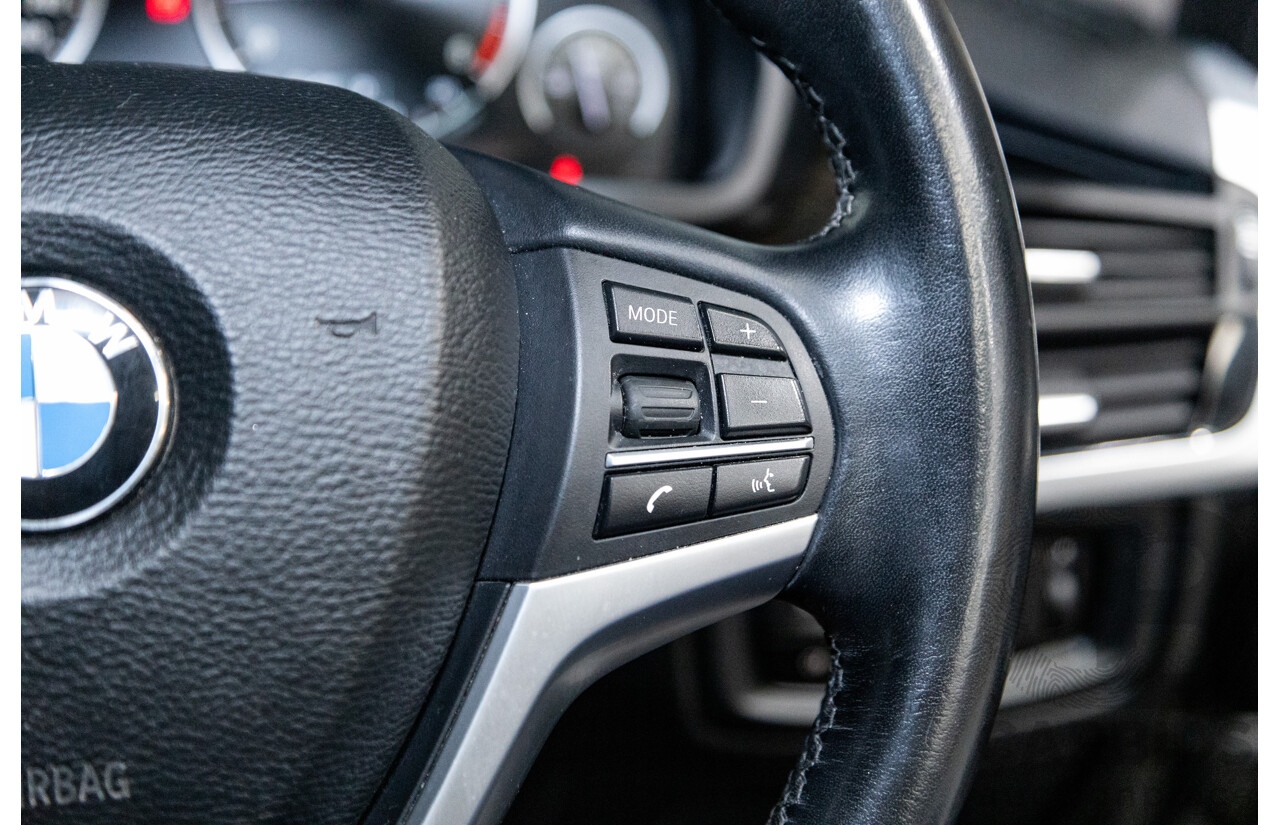 11/2013 BMW X5 xDrive30d (AWD) F15 4D Wagon Metallic Black Turbo Diesel 3.0L - 7 Seater