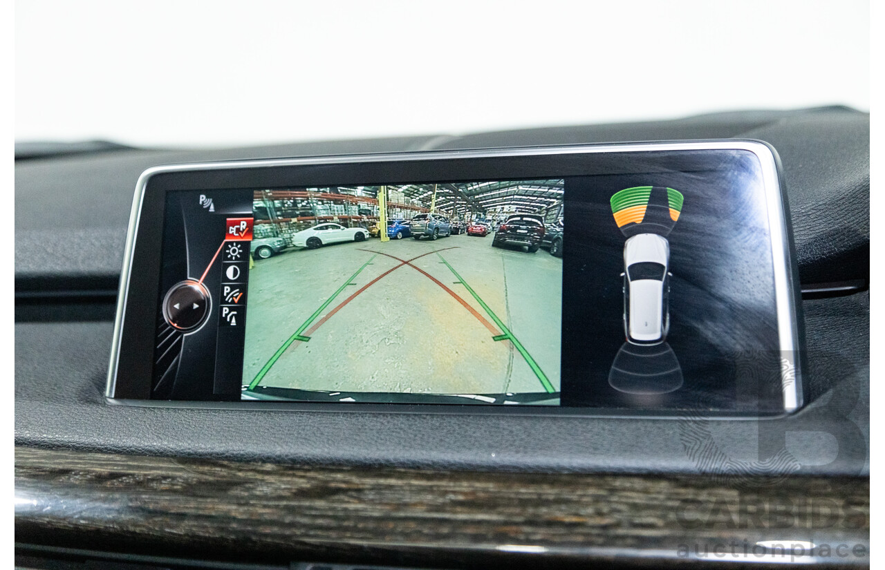 11/2013 BMW X5 xDrive30d (AWD) F15 4D Wagon Metallic Black Turbo Diesel 3.0L - 7 Seater