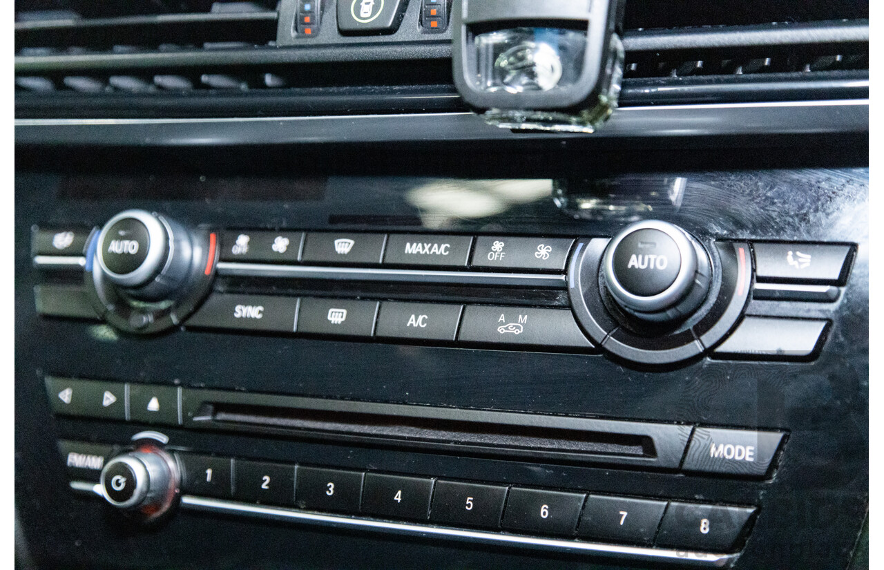 11/2013 BMW X5 xDrive30d (AWD) F15 4D Wagon Metallic Black Turbo Diesel 3.0L - 7 Seater