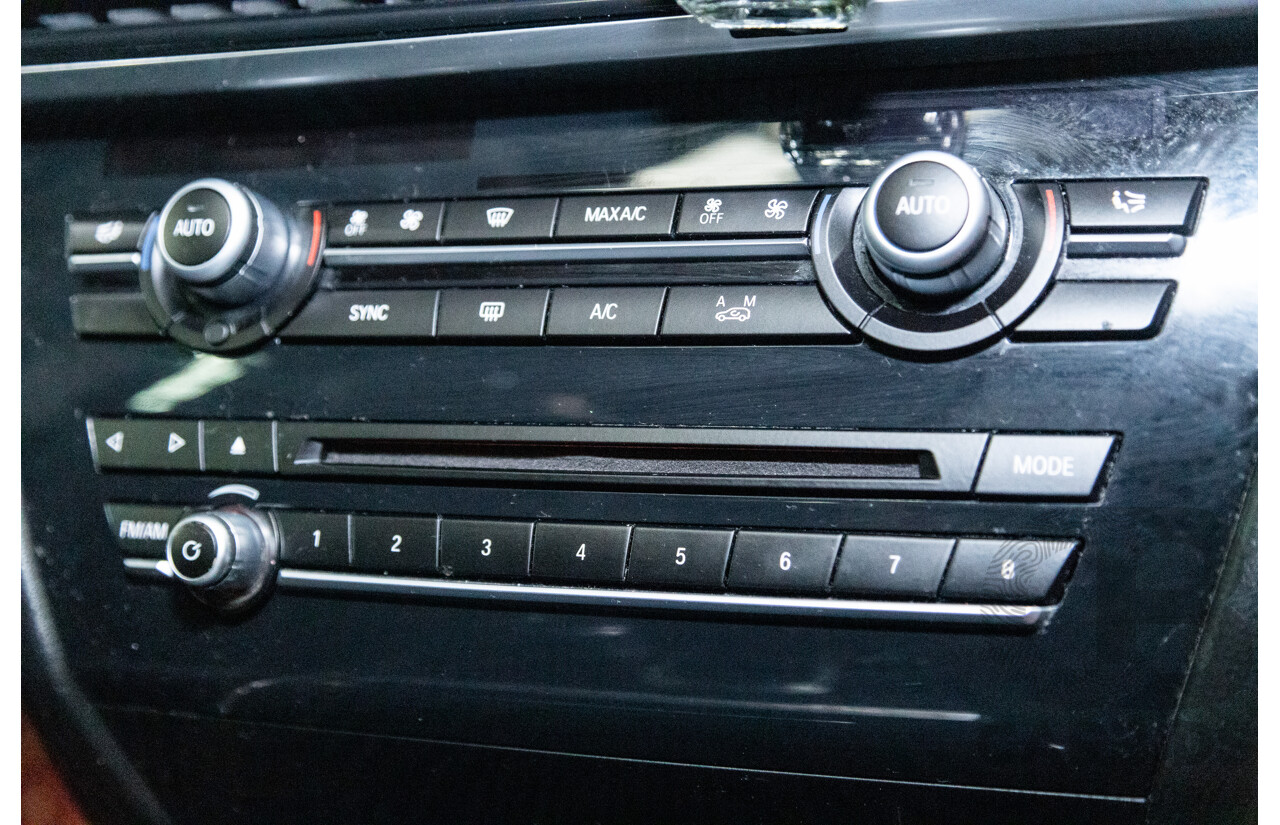 11/2013 BMW X5 xDrive30d (AWD) F15 4D Wagon Metallic Black Turbo Diesel 3.0L - 7 Seater