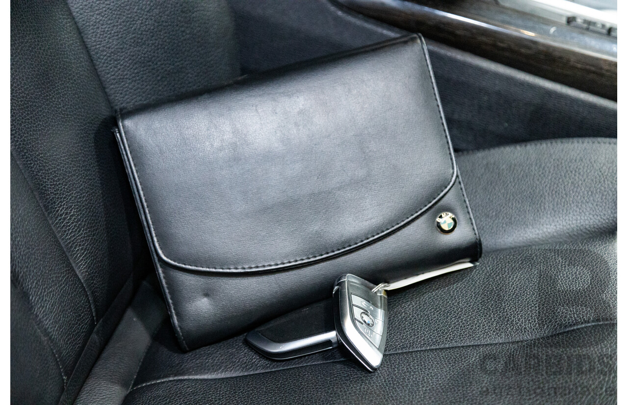 11/2013 BMW X5 xDrive30d (AWD) F15 4D Wagon Metallic Black Turbo Diesel 3.0L - 7 Seater