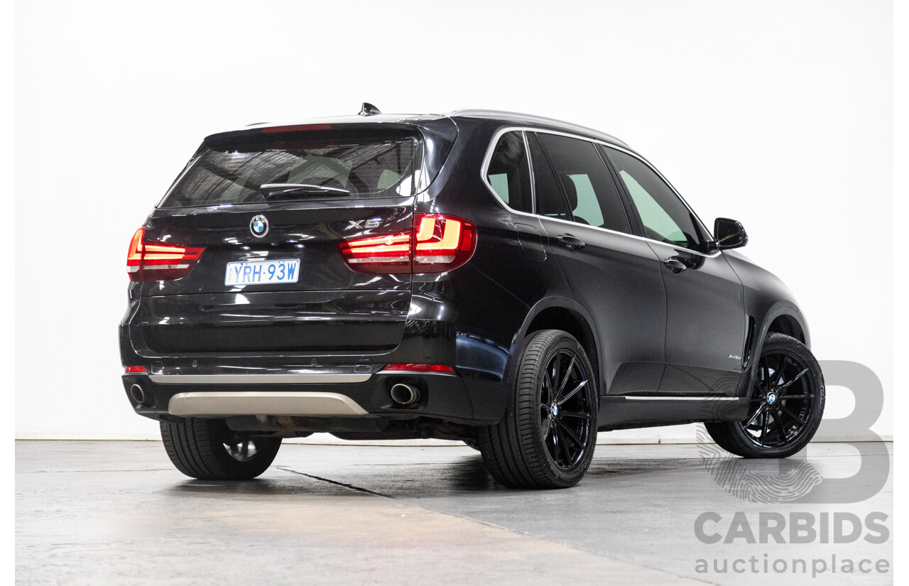 11/2013 BMW X5 xDrive30d (AWD) F15 4D Wagon Metallic Black Turbo Diesel 3.0L - 7 Seater