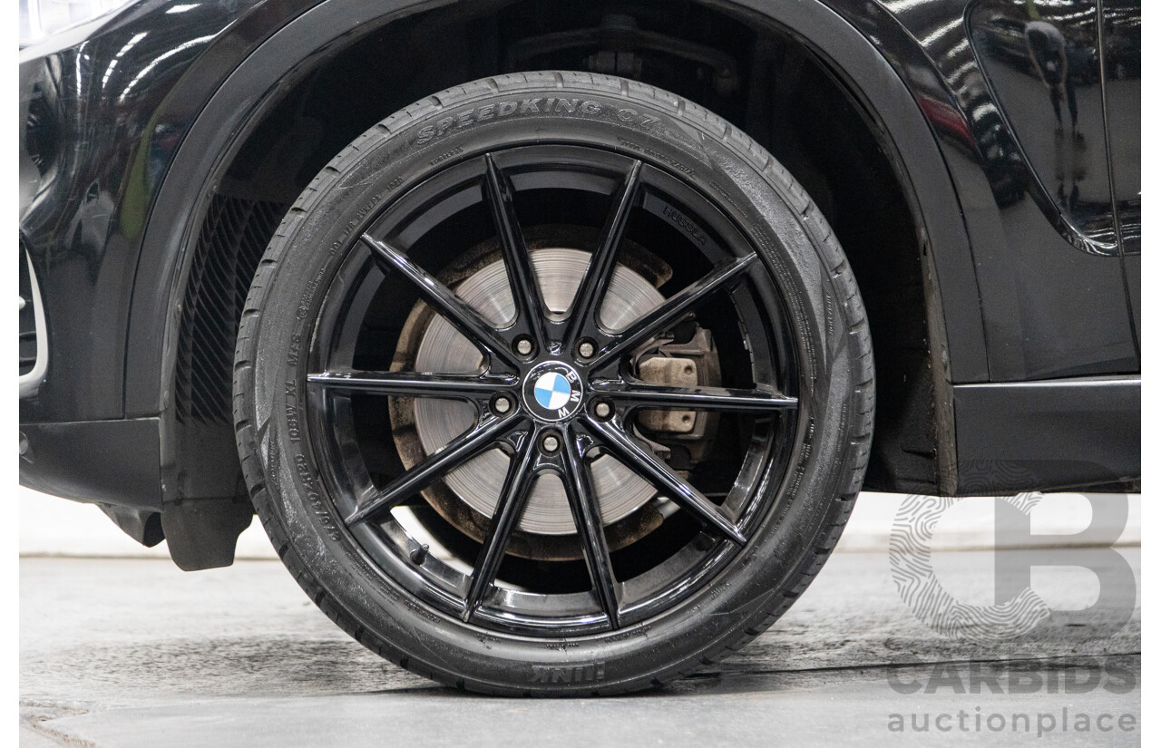 11/2013 BMW X5 xDrive30d (AWD) F15 4D Wagon Metallic Black Turbo Diesel 3.0L - 7 Seater