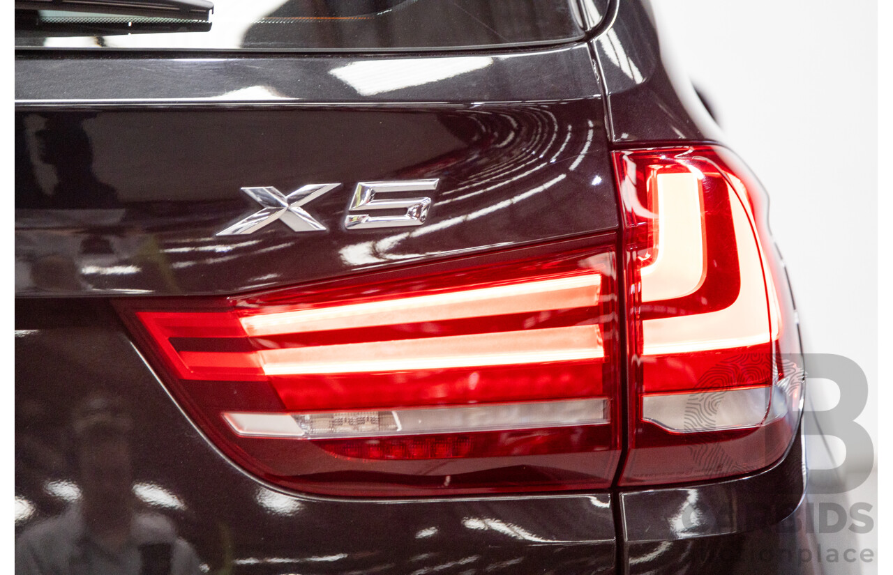 11/2013 BMW X5 xDrive30d (AWD) F15 4D Wagon Metallic Black Turbo Diesel 3.0L - 7 Seater
