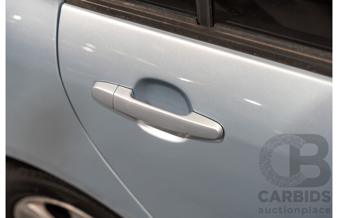 2/2007 Toyota Corolla Conquest SECA ZZE122R MY06 UPGRADE 5d Hatchback Blue 1.8L