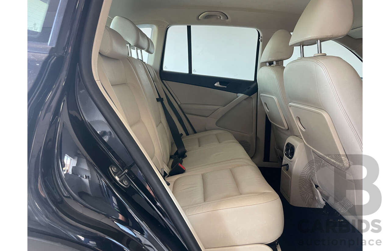 01/2011 Volkswagen Tiguan 125 TSI 4x4 5NC MY11 4D Wagon Black 2.0L