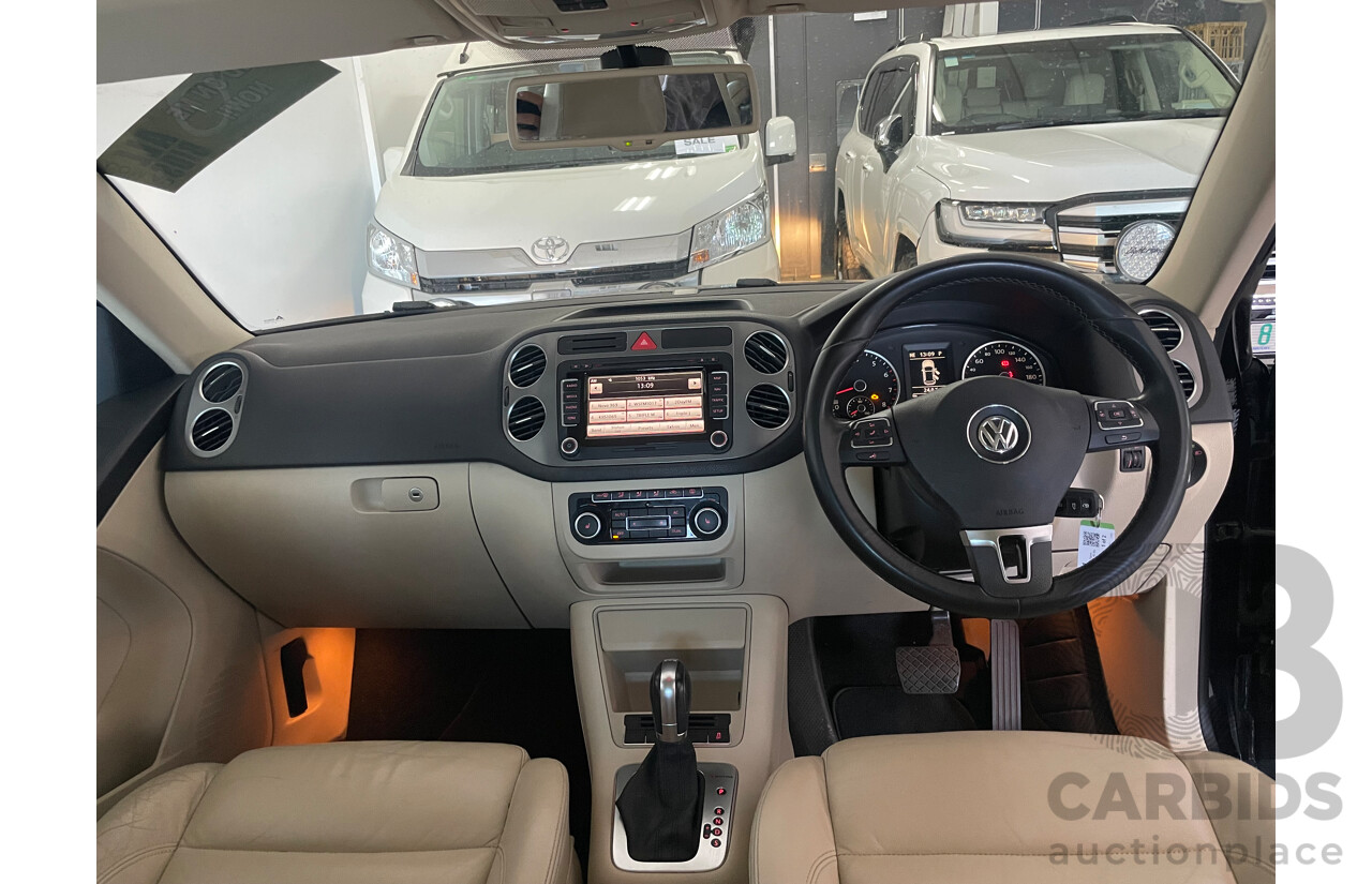 01/2011 Volkswagen Tiguan 125 TSI 4x4 5NC MY11 4D Wagon Black 2.0L