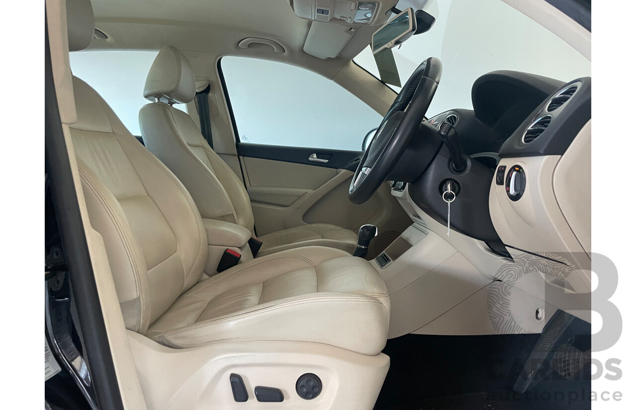 01/2011 Volkswagen Tiguan 125 TSI 4x4 5NC MY11 4D Wagon Black 2.0L