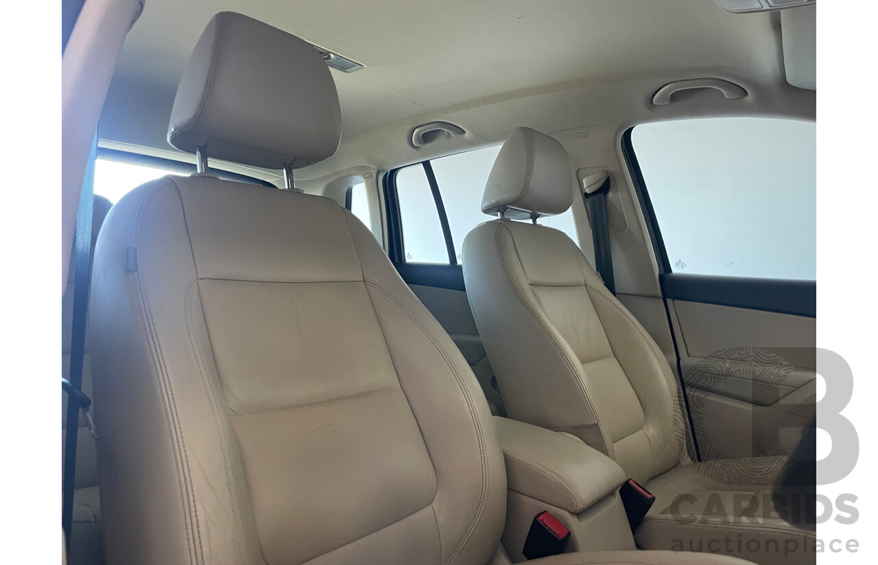 01/2011 Volkswagen Tiguan 125 TSI 4x4 5NC MY11 4D Wagon Black 2.0L