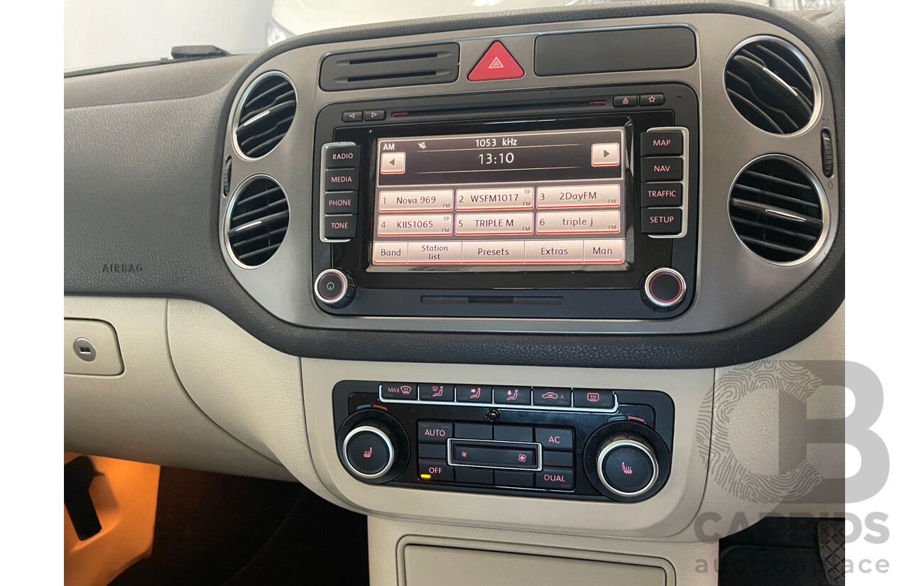 01/2011 Volkswagen Tiguan 125 TSI 4x4 5NC MY11 4D Wagon Black 2.0L