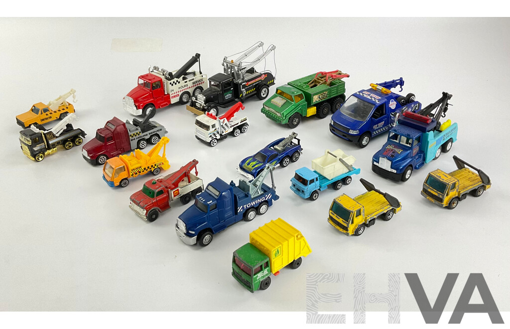 Assortment of Diecast Tow Trucks and Garbage Trucks Including Hot Wheels and Matchbox Battle Kings