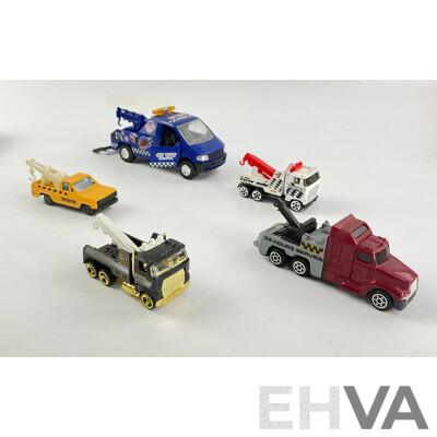 Assortment of Diecast Tow Trucks and Garbage Trucks Including Hot Wheels and Matchbox Battle Kings
