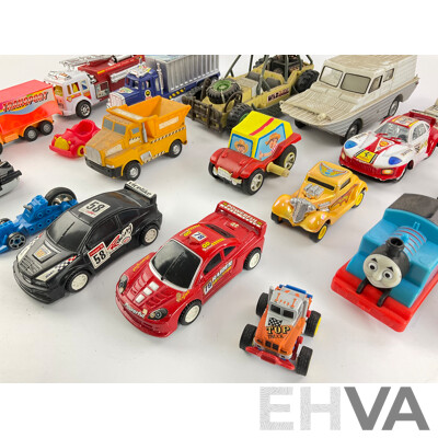Assortment of Plastic Toy Vehicles Incuding Trucks, Trains and Race Cars