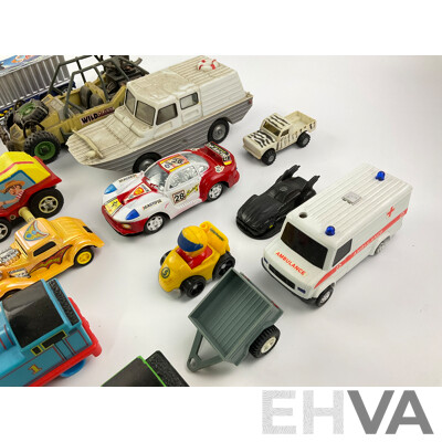 Assortment of Plastic Toy Vehicles Incuding Trucks, Trains and Race Cars