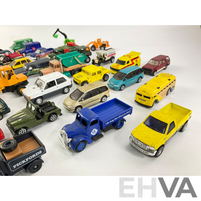Collection of Diecast Vans, Utilities, Trucks, 4x4s and Tractors Including Matchbox and Hot Wheels