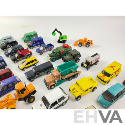 Collection of Diecast Vans, Utilities, Trucks, 4x4s and Tractors Including Matchbox and Hot Wheels