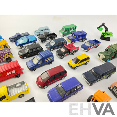 Collection of Diecast Vans, Utilities, Trucks, 4x4s and Tractors Including Matchbox and Hot Wheels