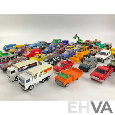 Collection of Diecast Vans, Utilities, Trucks, 4x4s and Tractors Including Matchbox and Hot Wheels