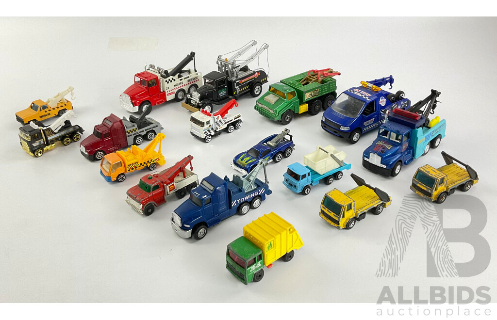 Assortment of Diecast Tow Trucks and Garbage Trucks Including Hot Wheels and Matchbox Battle Kings