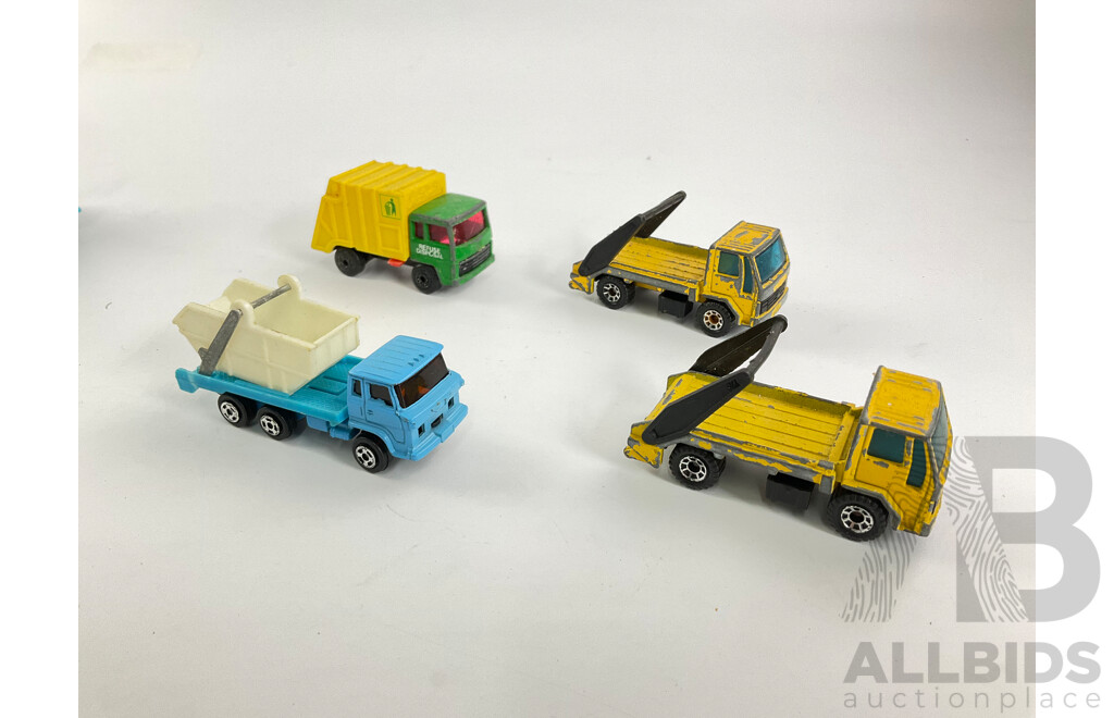Assortment of Diecast Tow Trucks and Garbage Trucks Including Hot Wheels and Matchbox Battle Kings