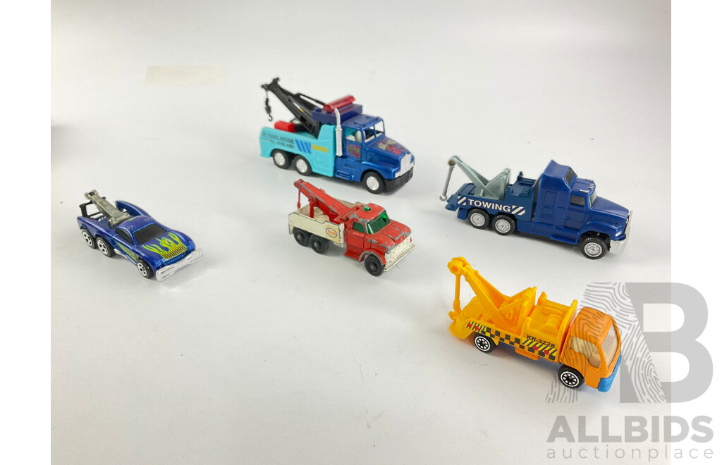Assortment of Diecast Tow Trucks and Garbage Trucks Including Hot Wheels and Matchbox Battle Kings
