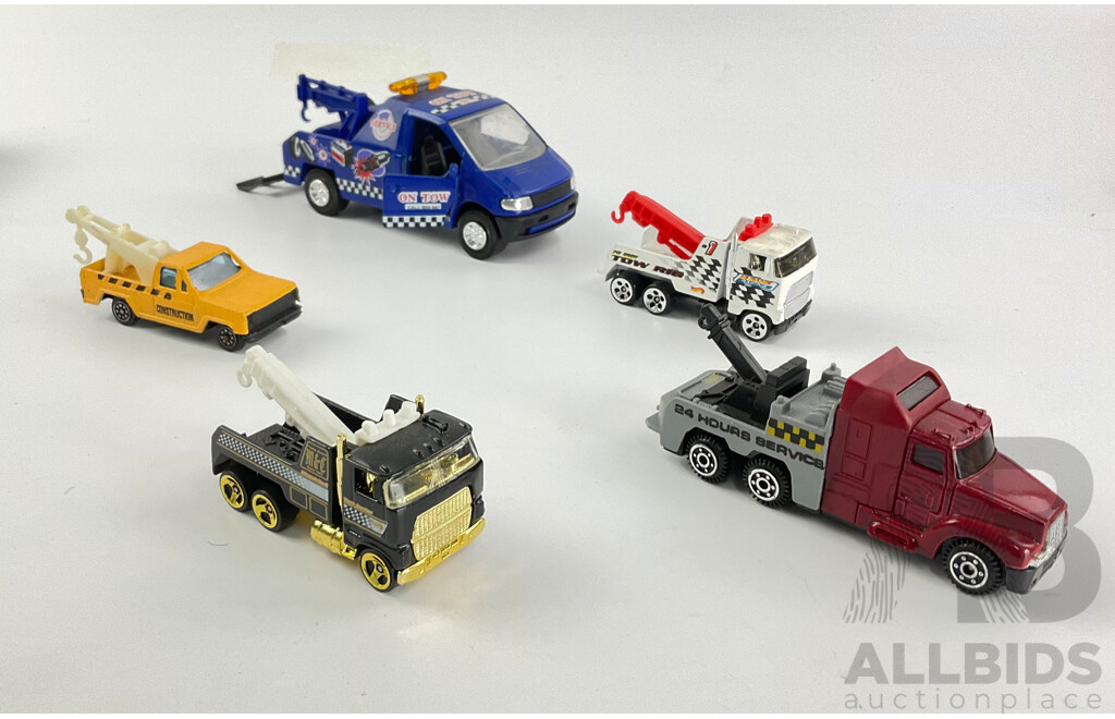 Assortment of Diecast Tow Trucks and Garbage Trucks Including Hot Wheels and Matchbox Battle Kings