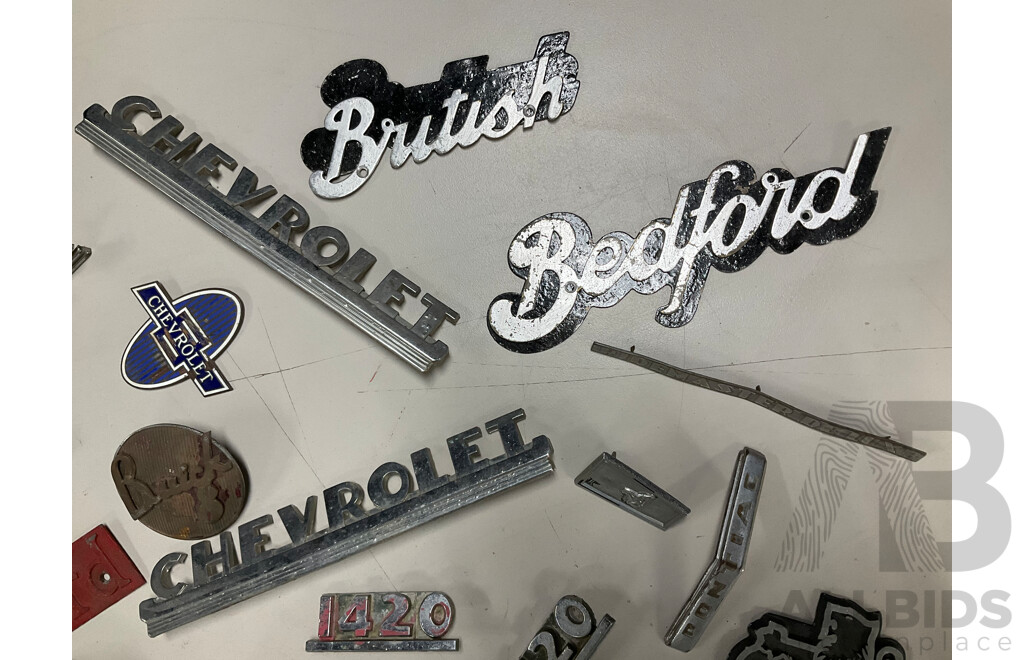 Collection of Mostly General Motors Vintage Badges Including Chevrolet, Holden, Pontiac, Buick, Bedford and More
