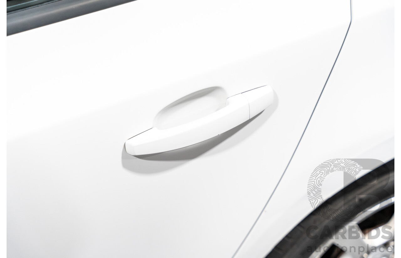 05/2010 Holden Cruze CD JG 4d Sedan White 1.8L