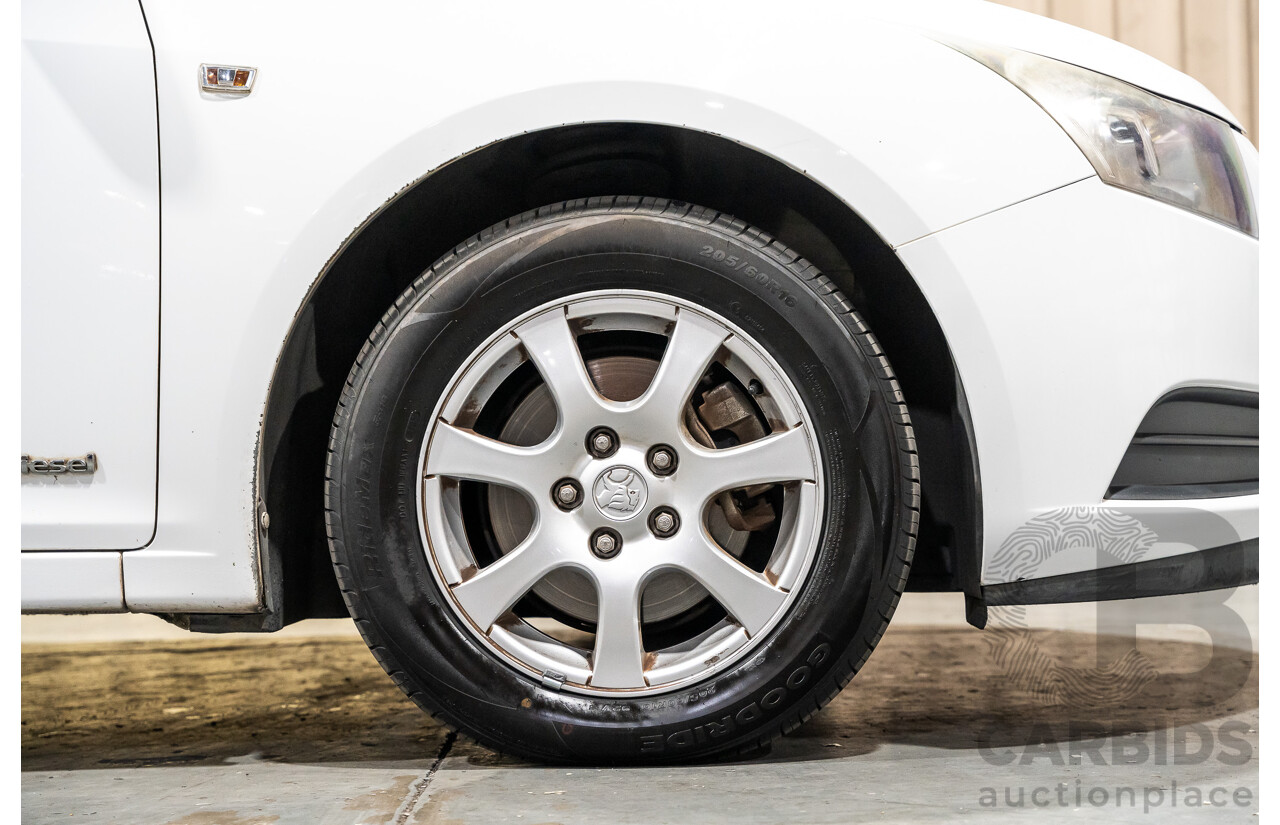 05/2010 Holden Cruze CD JG 4d Sedan White 1.8L