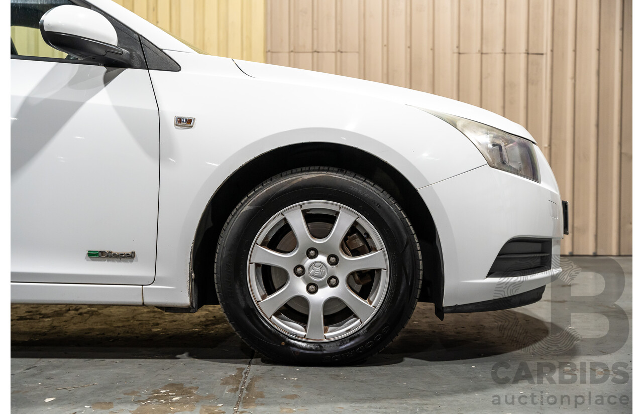 05/2010 Holden Cruze CD JG 4d Sedan White 1.8L