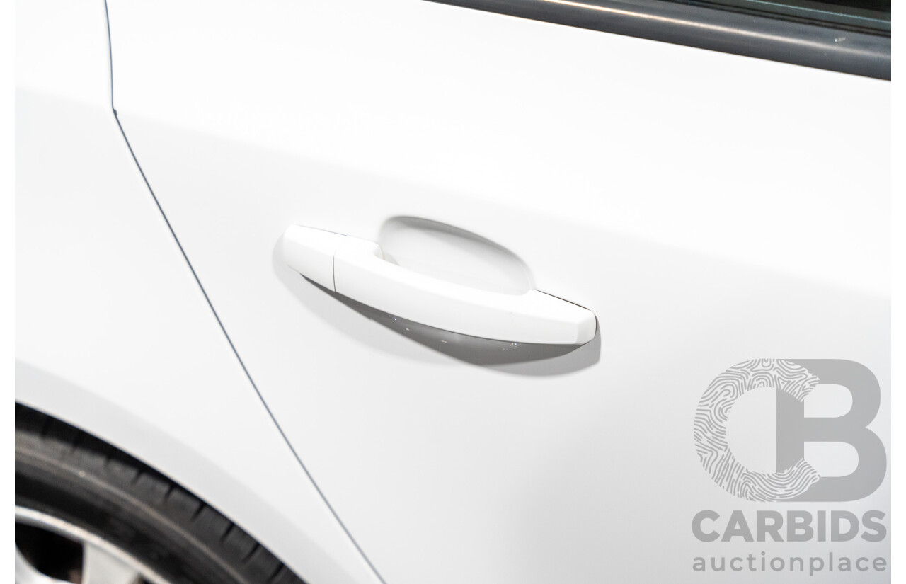 05/2010 Holden Cruze CD JG 4d Sedan White 1.8L