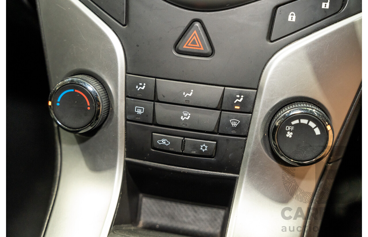 05/2010 Holden Cruze CD JG 4d Sedan White 1.8L