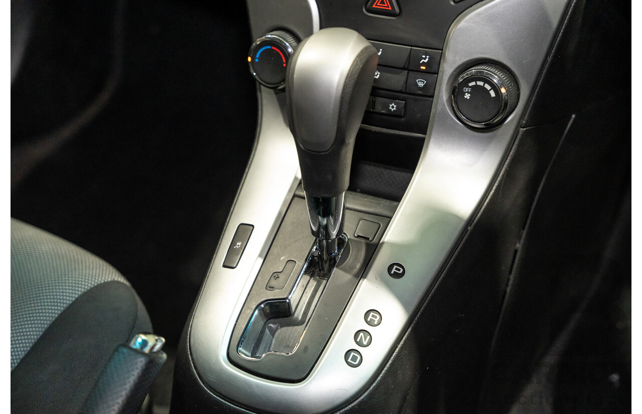 05/2010 Holden Cruze CD JG 4d Sedan White 1.8L