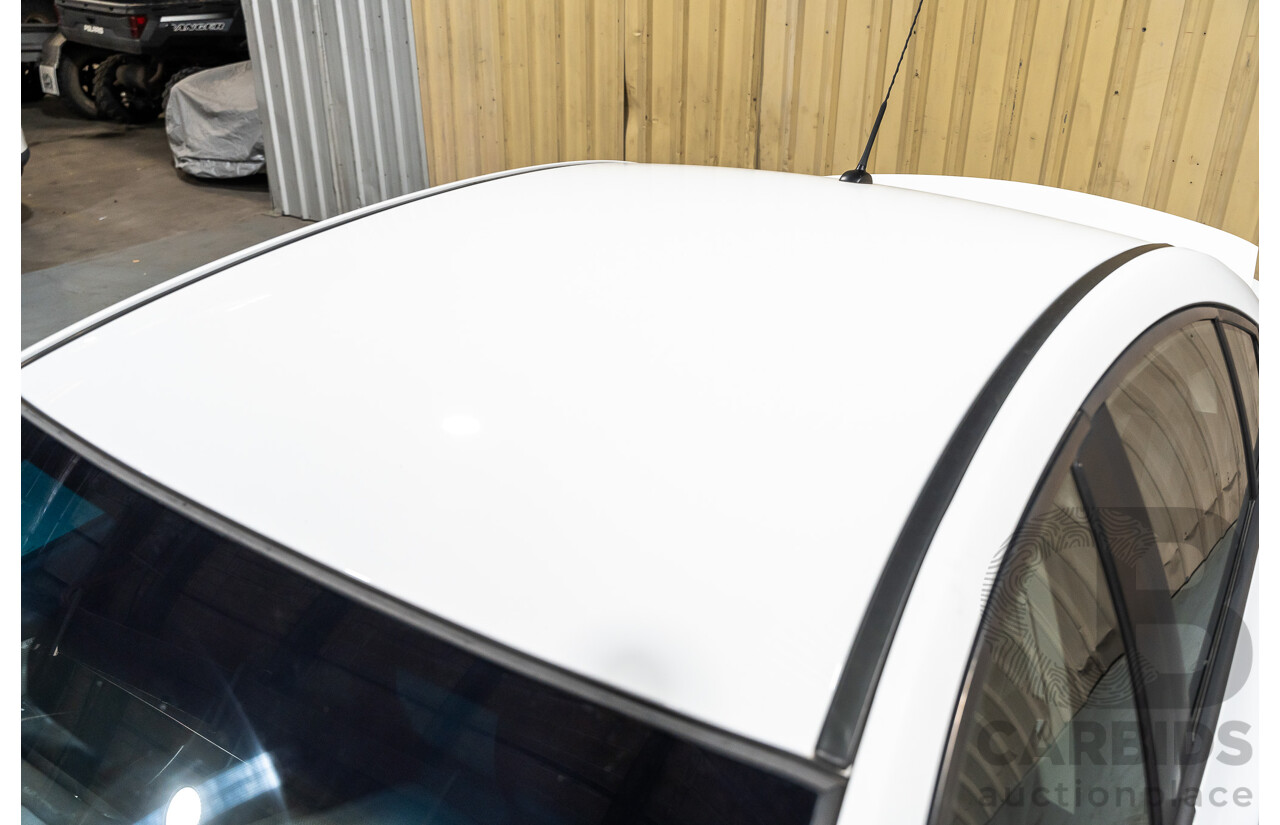 05/2010 Holden Cruze CD JG 4d Sedan White 1.8L