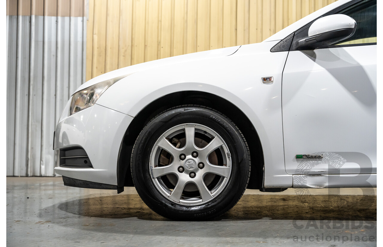 05/2010 Holden Cruze CD JG 4d Sedan White 1.8L