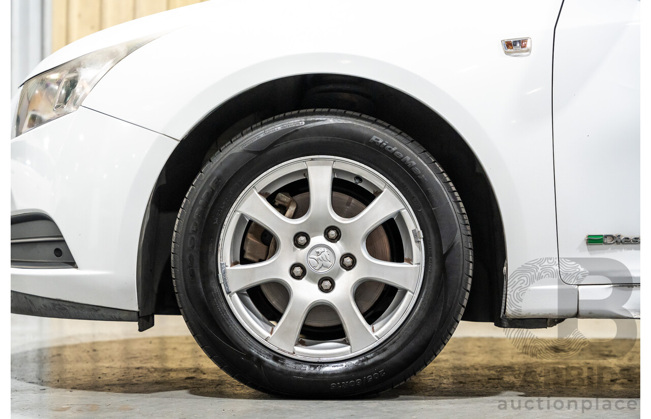 05/2010 Holden Cruze CD JG 4d Sedan White 1.8L