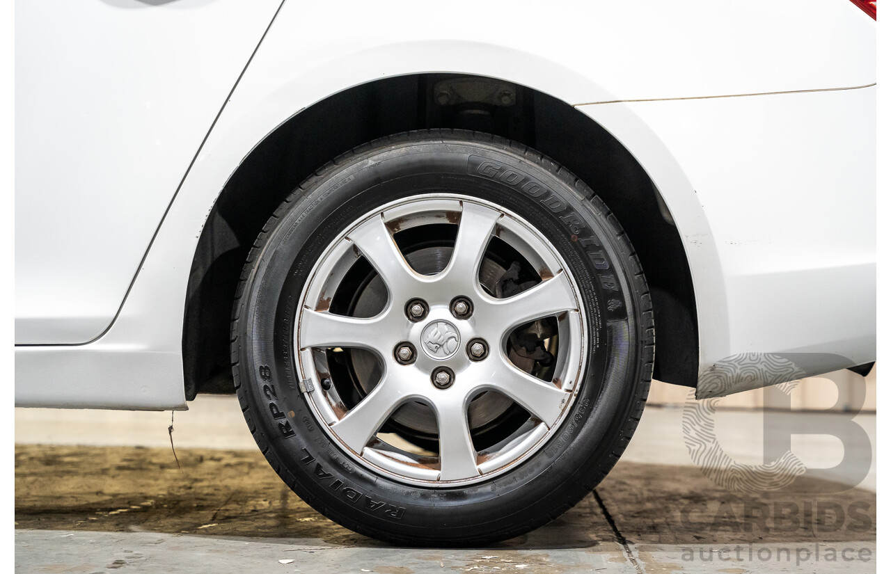 05/2010 Holden Cruze CD JG 4d Sedan White 1.8L