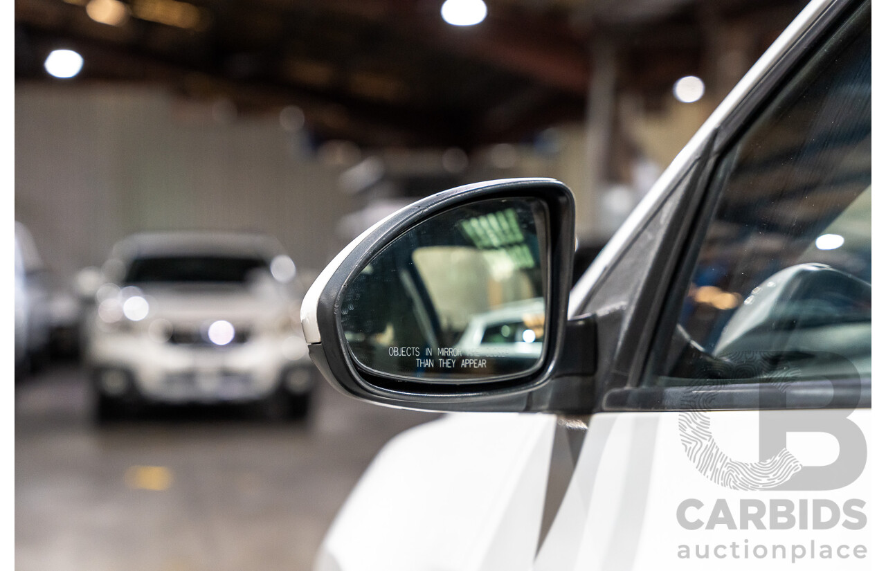 05/2010 Holden Cruze CD JG 4d Sedan White 1.8L