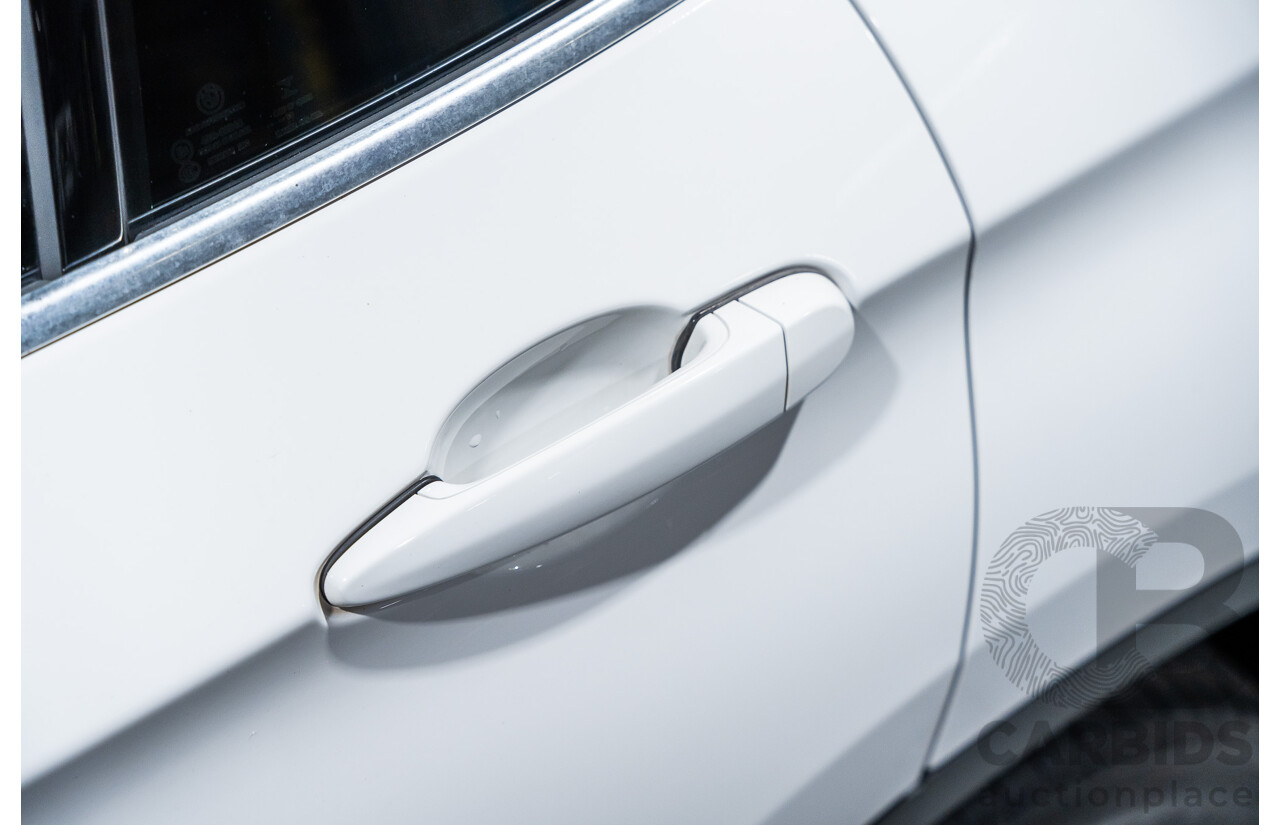 4/2015 BMW X1 Sdrive 20i Sportline E84 MY15 4d Wagon White Turbo 2.0L