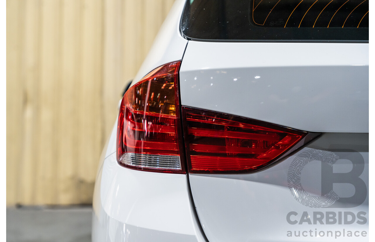 4/2015 BMW X1 Sdrive 20i Sportline E84 MY15 4d Wagon White Turbo 2.0L