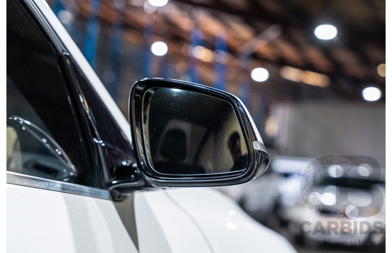 4/2015 BMW X1 Sdrive 20i Sportline E84 MY15 4d Wagon White Turbo 2.0L